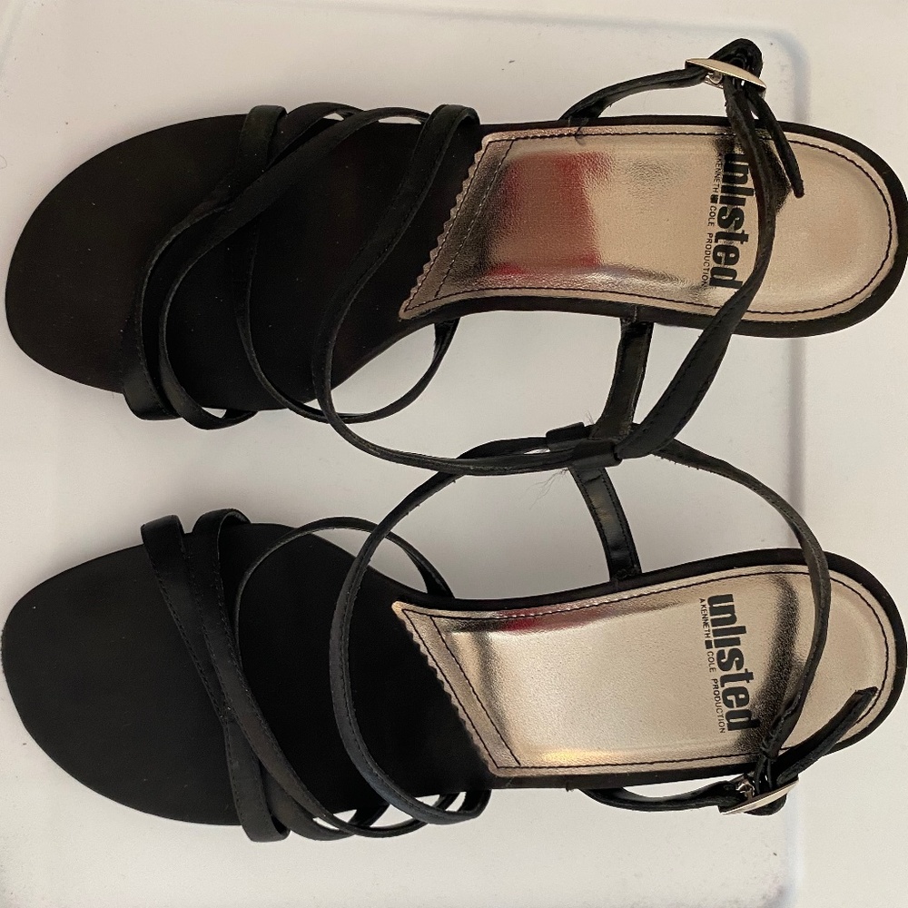 Unlisted black strap heel